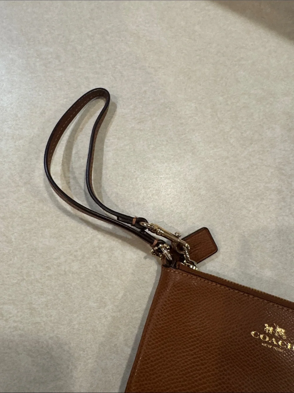 Coach Brown Pebbled Leather Wristlet with Gold Logo